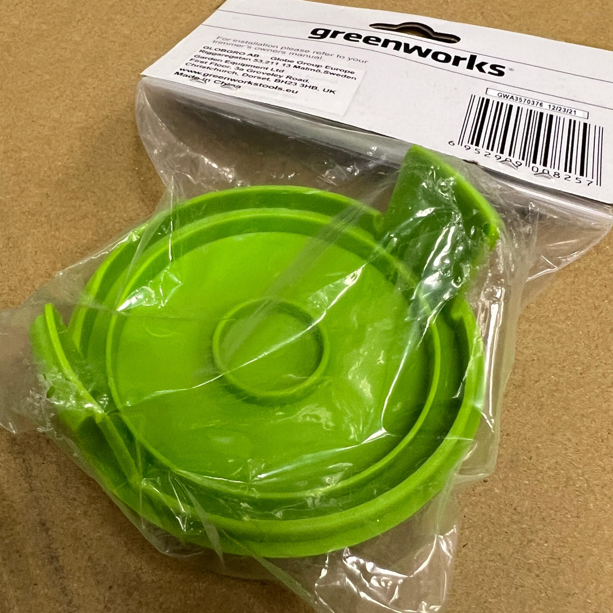 Крышка шпули пластиковая зеленая 2907907 для триммеров Greenworks GST5033M 500W Deluxe, GST5033 500W Basic